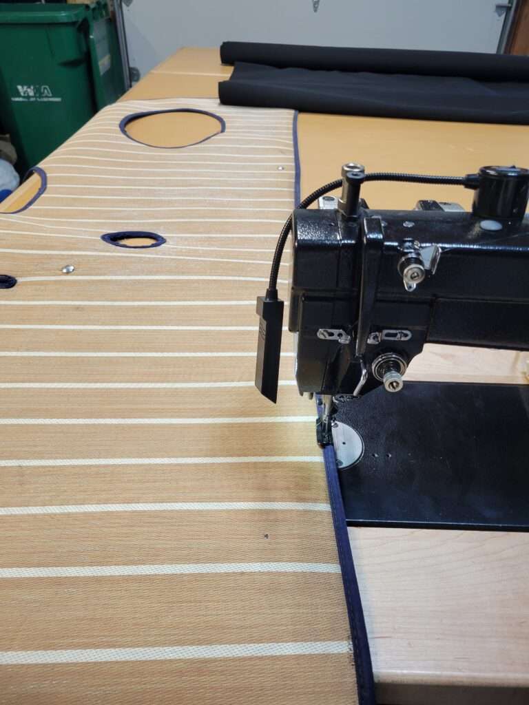 Custom marine canvas detail installed on a boat deck