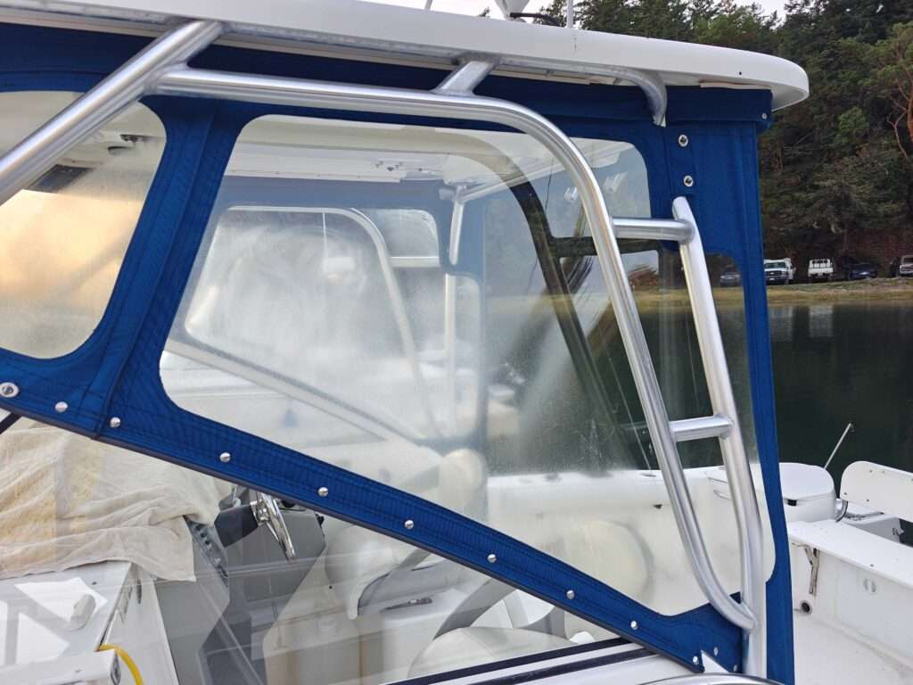 Before: cloudy, worn clear vinyl boat window