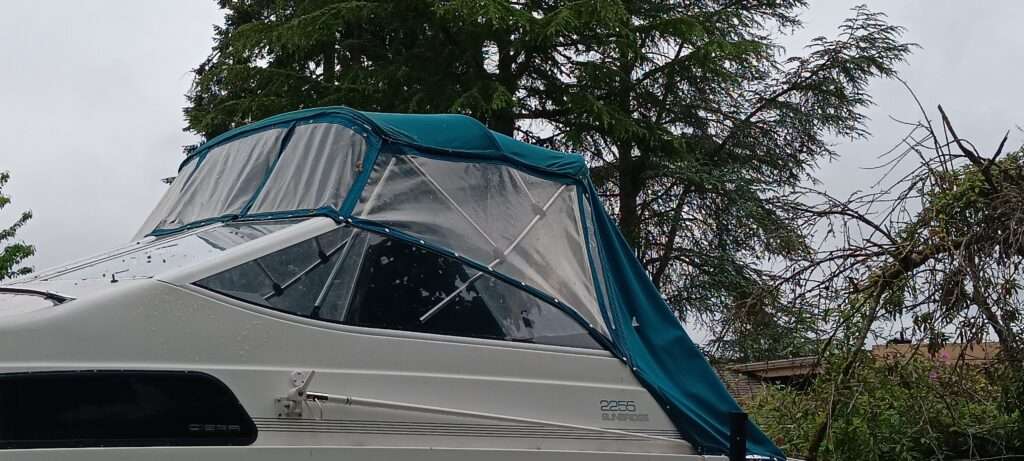 Before: worn enclosure canvas on a Bayliner