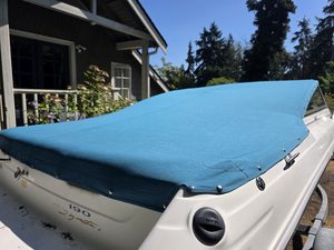 Turquoise Sunbrella cockpit cover