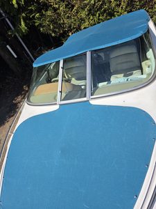 Turquoise Sunbrella bow (tonneau) cover